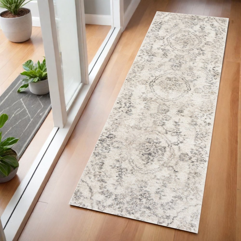 7' Gray And Tan Floral Distressed Runner Rug