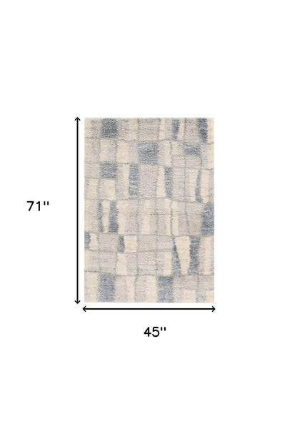 7' X 9' Ivory and Blue Area Rug