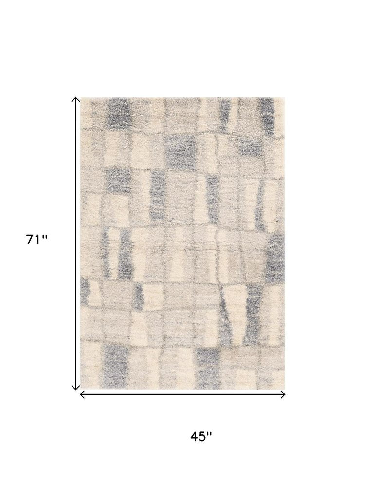 7' X 9' Ivory and Blue Area Rug