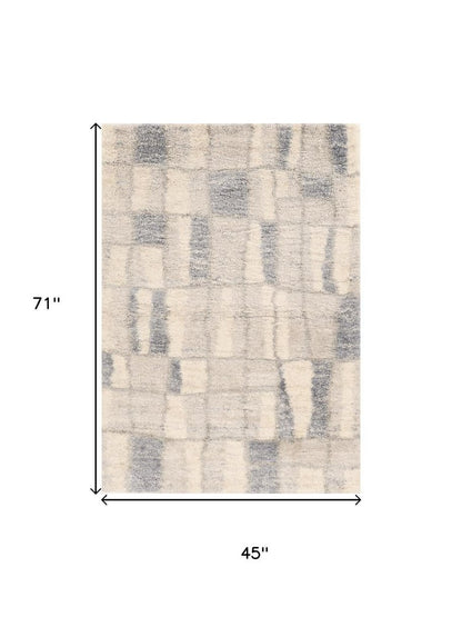 7' X 9' Ivory and Blue Area Rug