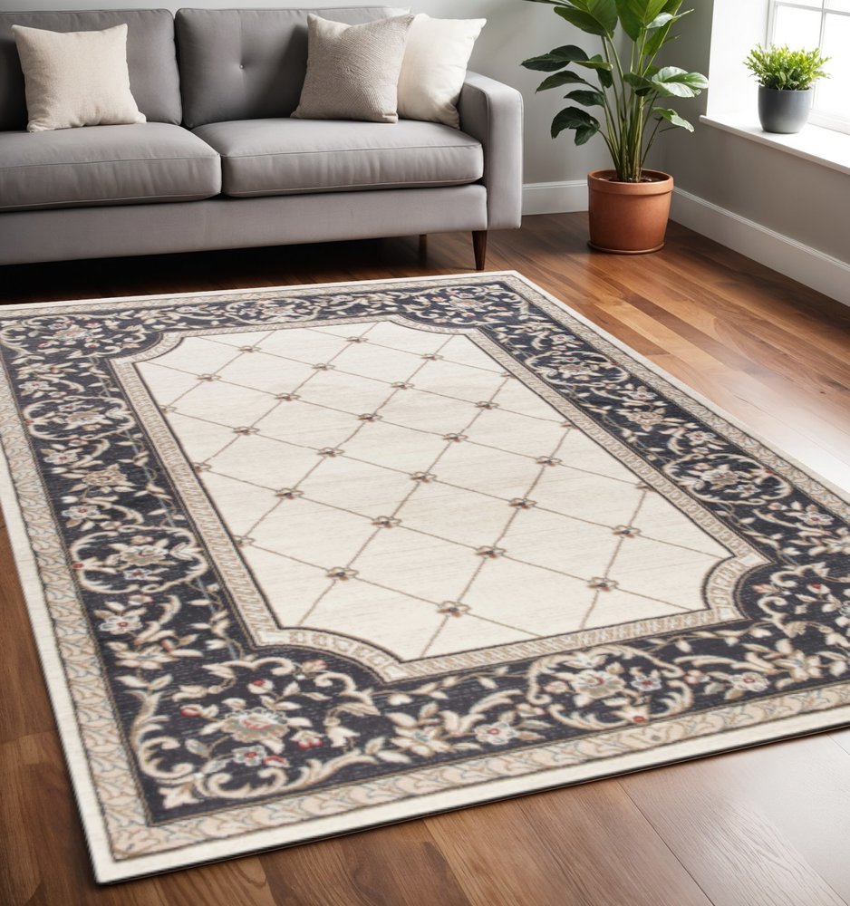 5' X 8' Ivory And Gray Floral Area Rug