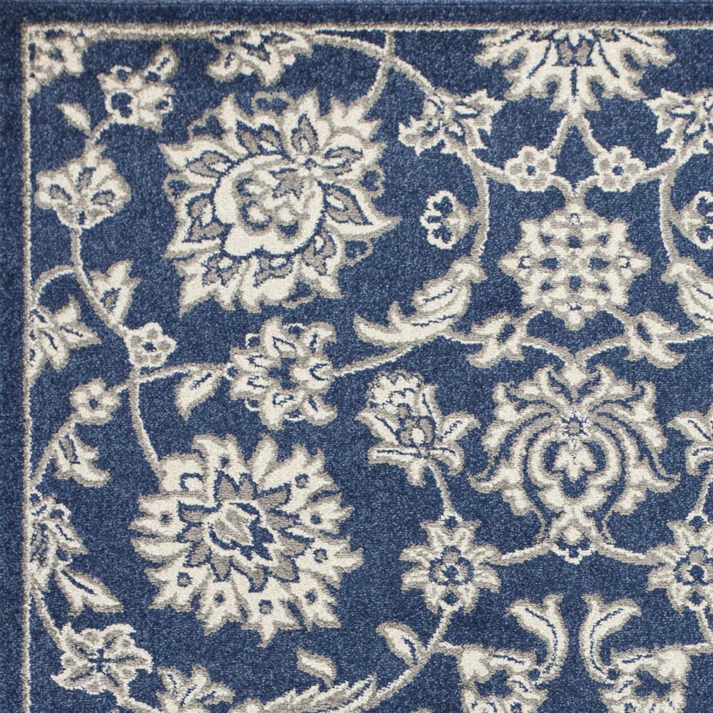 5' X 8' Blue And Ivory Floral Medallion Area Rug