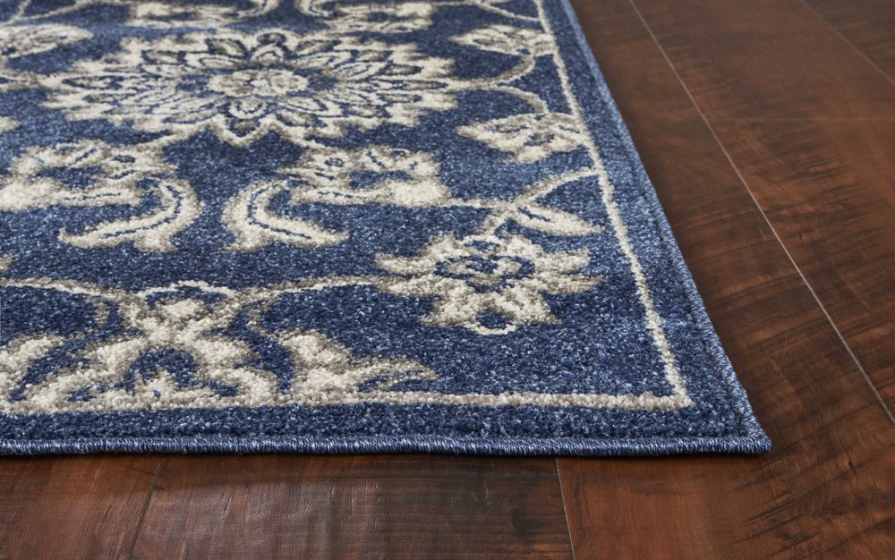 5' X 8' Blue And Ivory Floral Medallion Area Rug