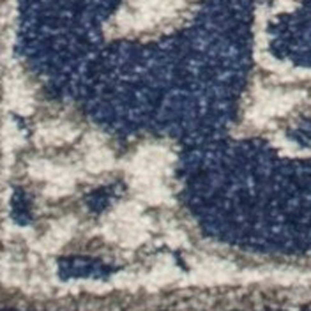 5' X 8' Blue And Ivory Floral Medallion Area Rug
