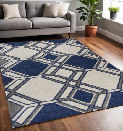 5' X 8' Blue Ivory And Gray Geometric Area Rug
