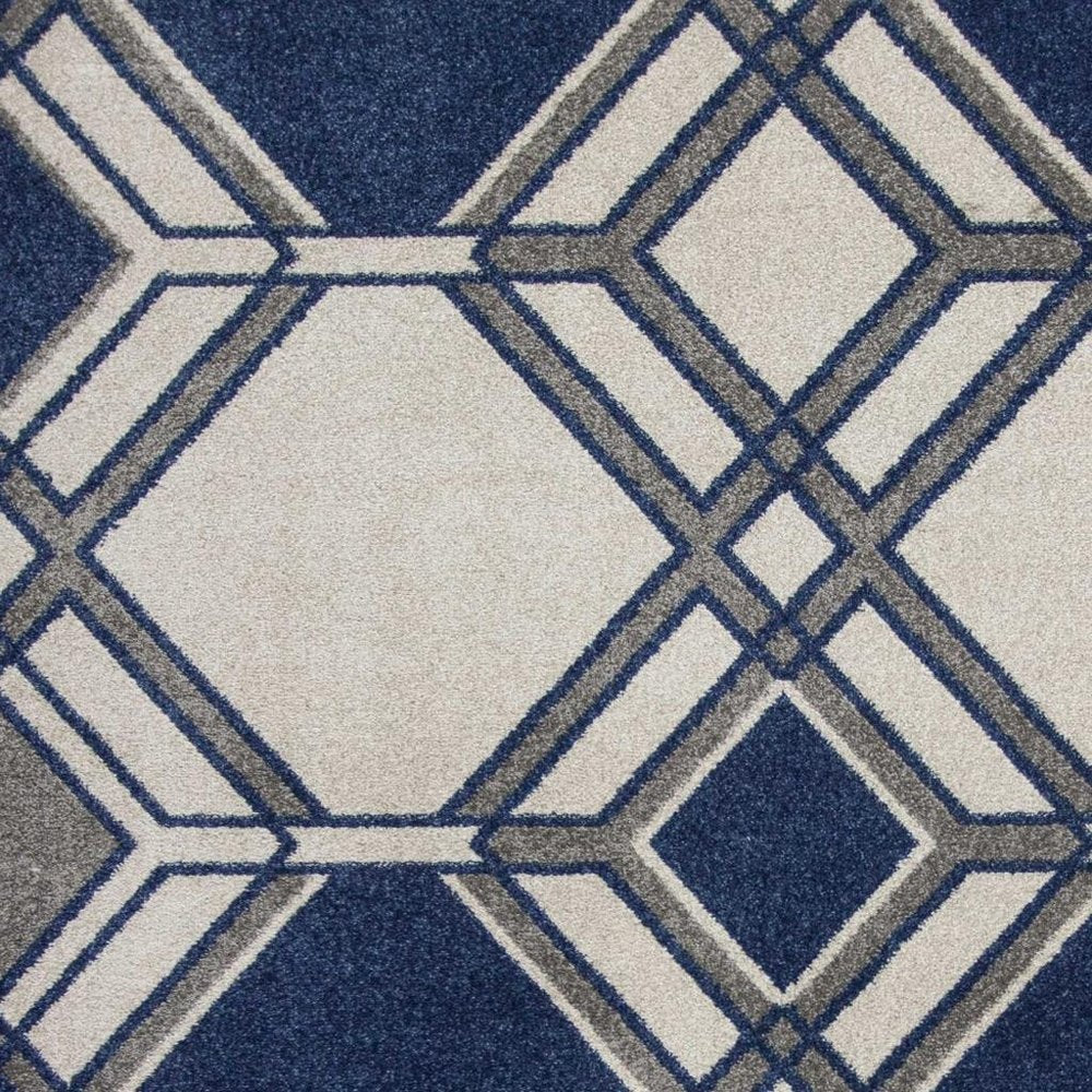 5' X 8' Blue Ivory And Gray Geometric Area Rug