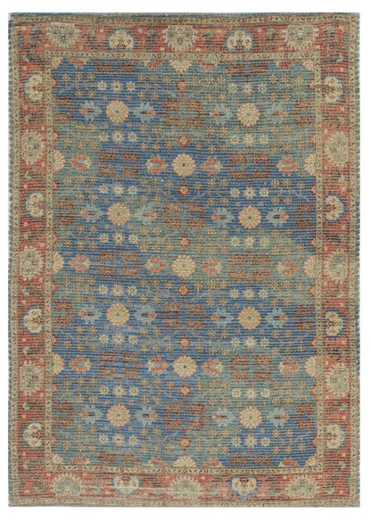 7' X 9' Blue Red And Beige Floral Medallion Hand Woven Area Rug