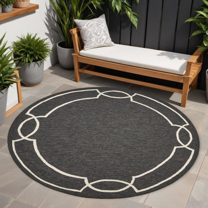 7' Onyx And Ivory Round Geometric Handmade Indoor Outdoor Area Rug
