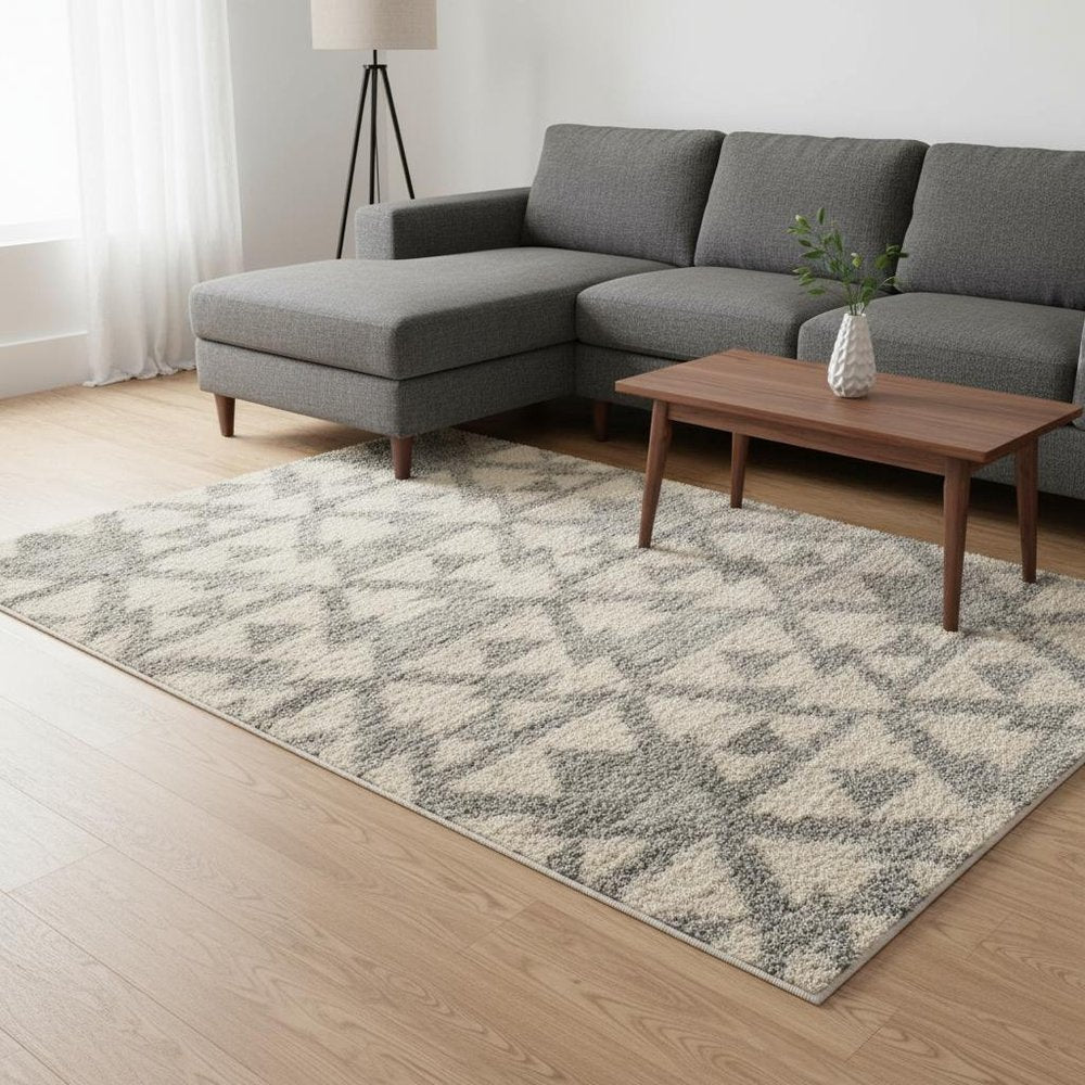 4' X 6' Ivory And Gray Geometric Distressed Area Rug