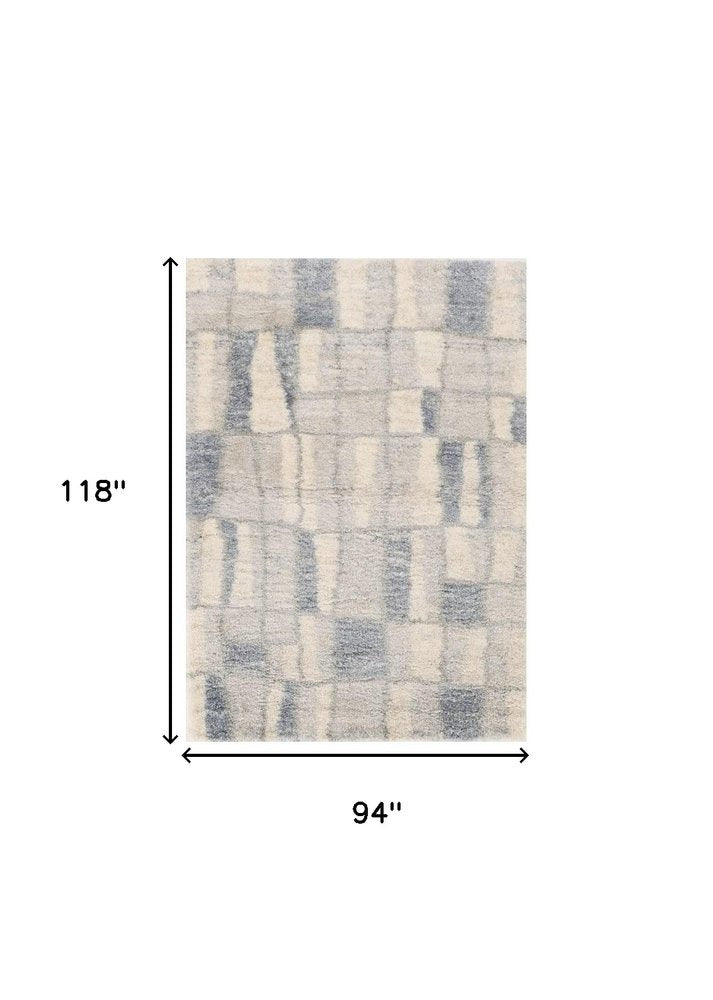 4' X 6' Ivory And Blue Abstract Geometric Distressed Area Rug
