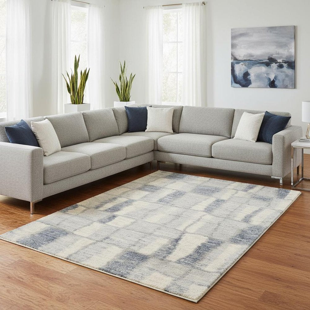 7' X 9' Ivory and Blue Area Rug