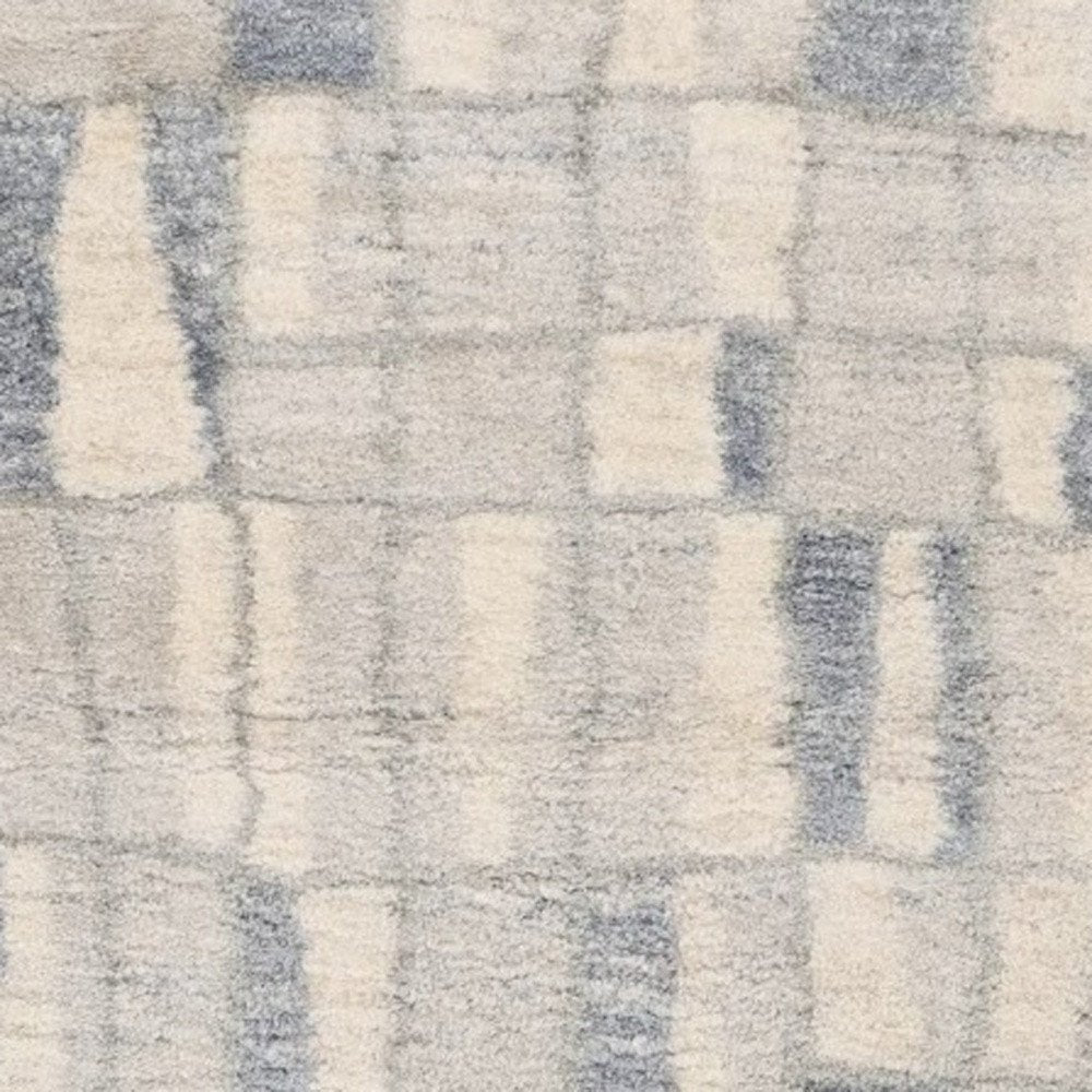 7' X 9' Ivory and Blue Area Rug