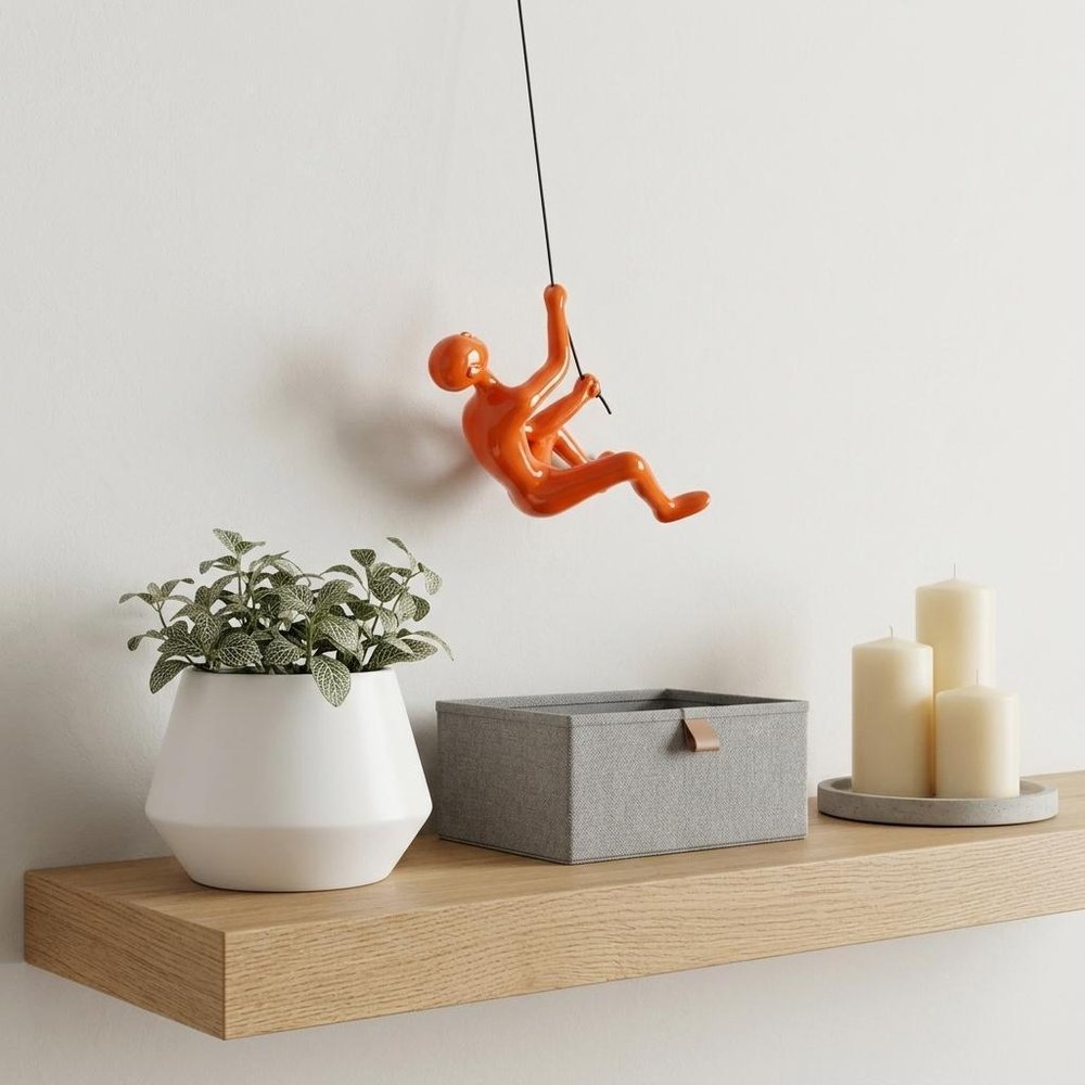 6" X 3" Orange Resin Climbing Man Hanging Dimensional Sculpture