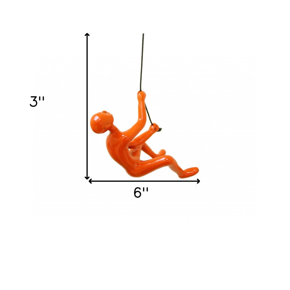 6" X 3" Orange Resin Climbing Man Hanging Dimensional Sculpture
