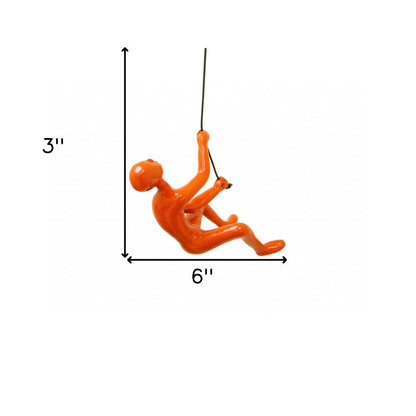 6" X 3" Orange Resin Climbing Man Hanging Dimensional Sculpture
