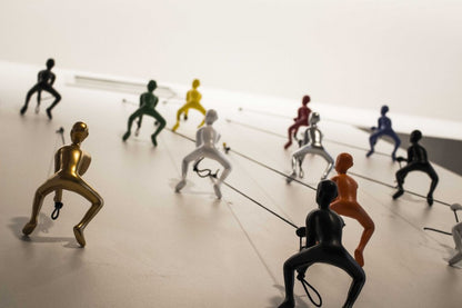 Set of Nine Rainbow Resin Climbing Man Hanging Dimensional Sculpture