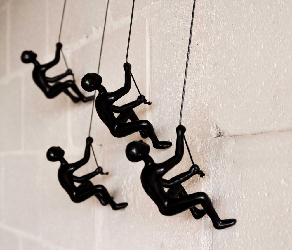 Set of Four Black Resin Climbing Man Hanging Dimensional Sculpture