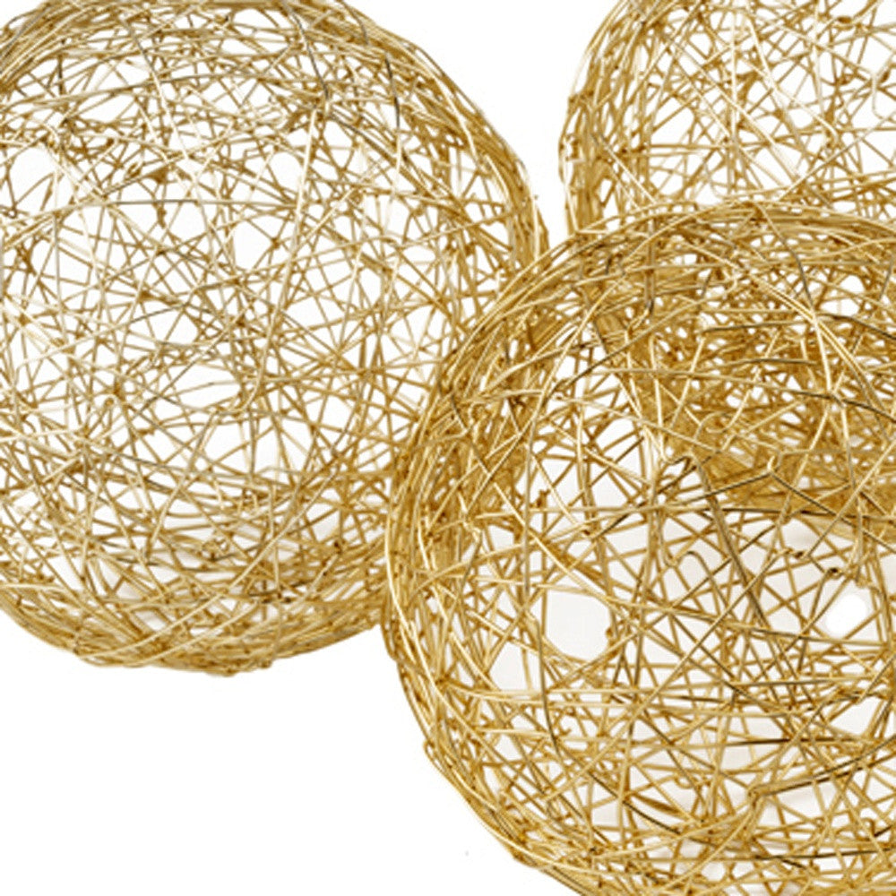 Set of Three Gold Aluminum Decorative Orbs