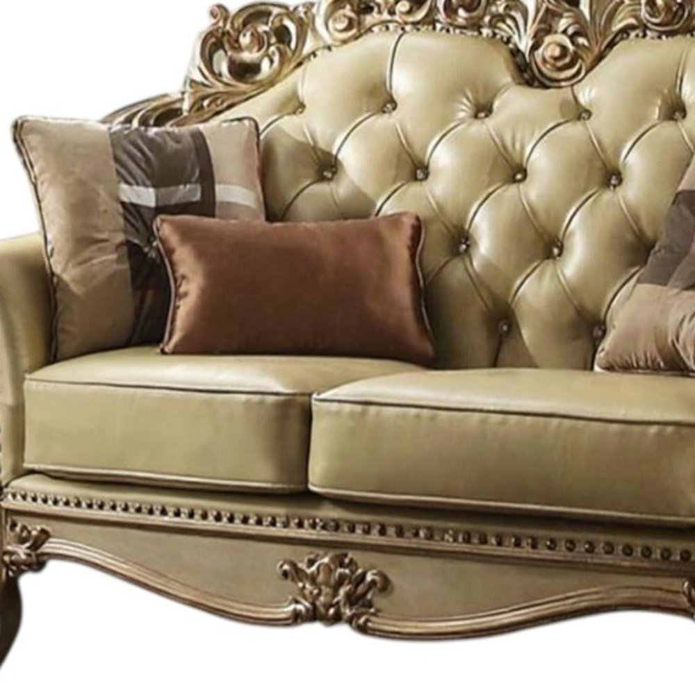70" Bone And Gold Faux Leather Curved Loveseat