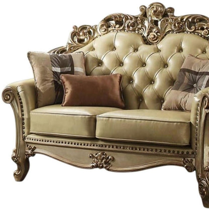 70" Bone And Gold Faux Leather Curved Loveseat