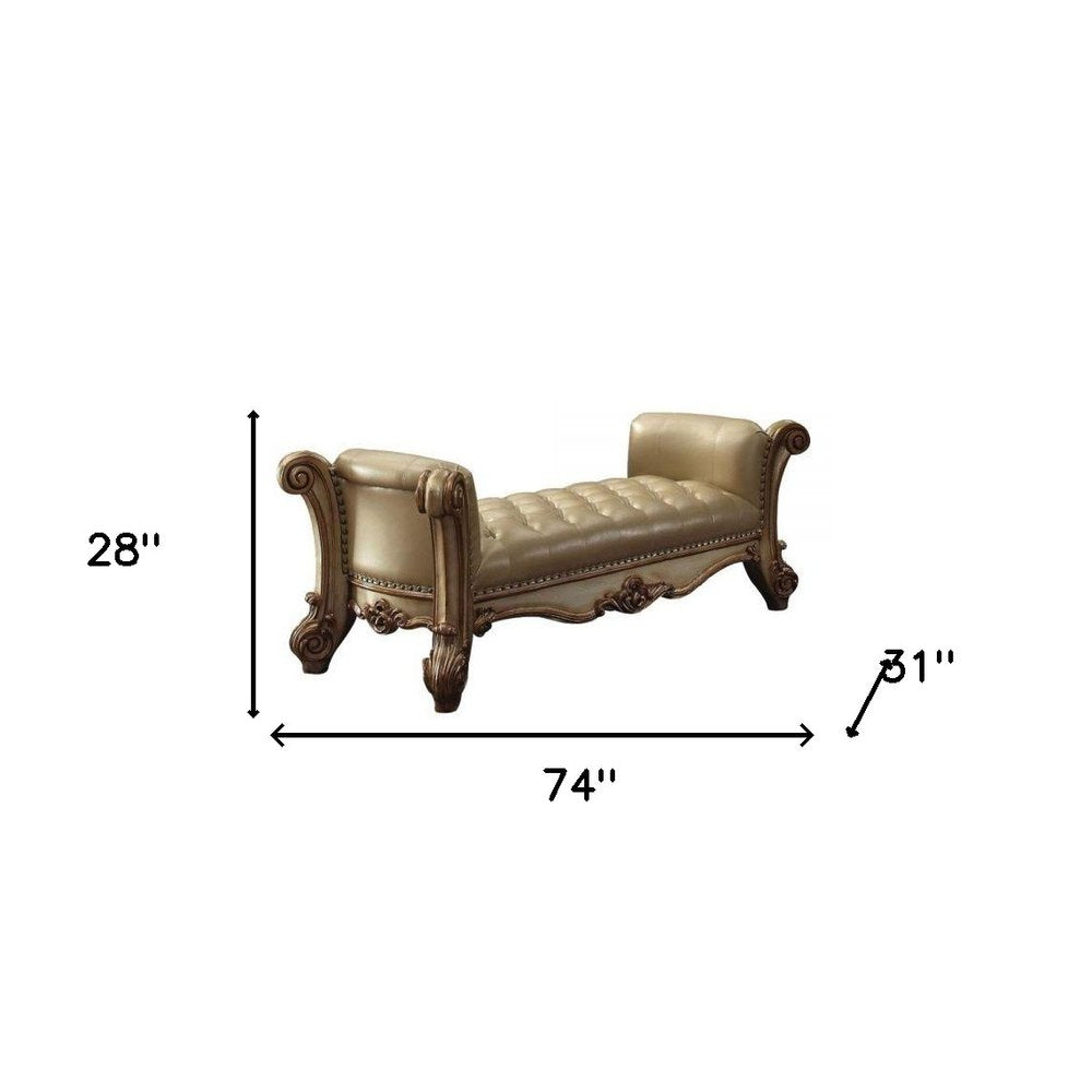 74" Bone And Gold Tufted Faux Leather And Solid Wood Upholstered Bench