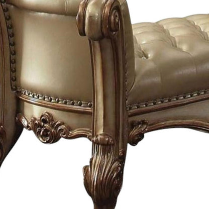 74" Bone And Gold Tufted Faux Leather And Solid Wood Upholstered Bench