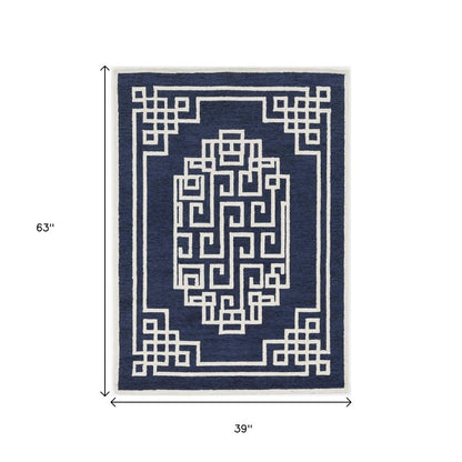 8' X 10' Navy Blue And Ivory Wool Geometric Hand Tufted Area Rug