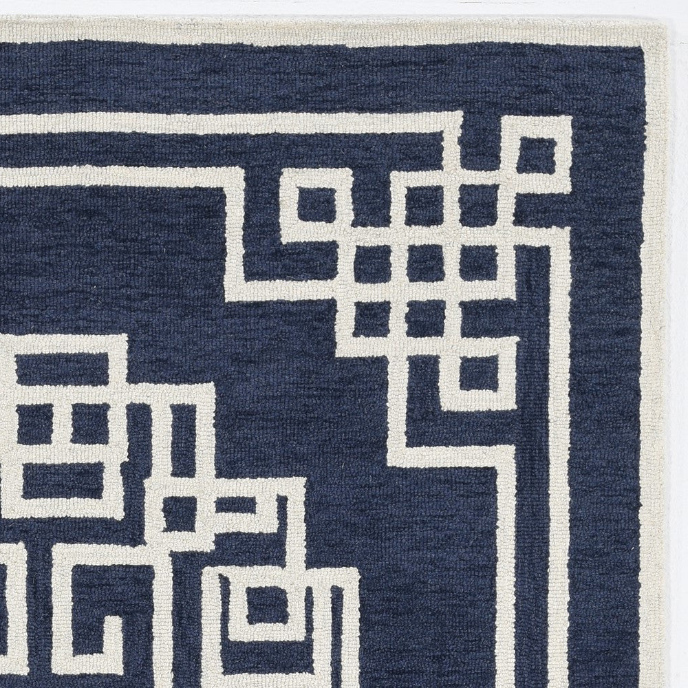 8' X 10' Navy Blue Ivory Hand Tufted Greek Key Medallion Indoor Area Rug