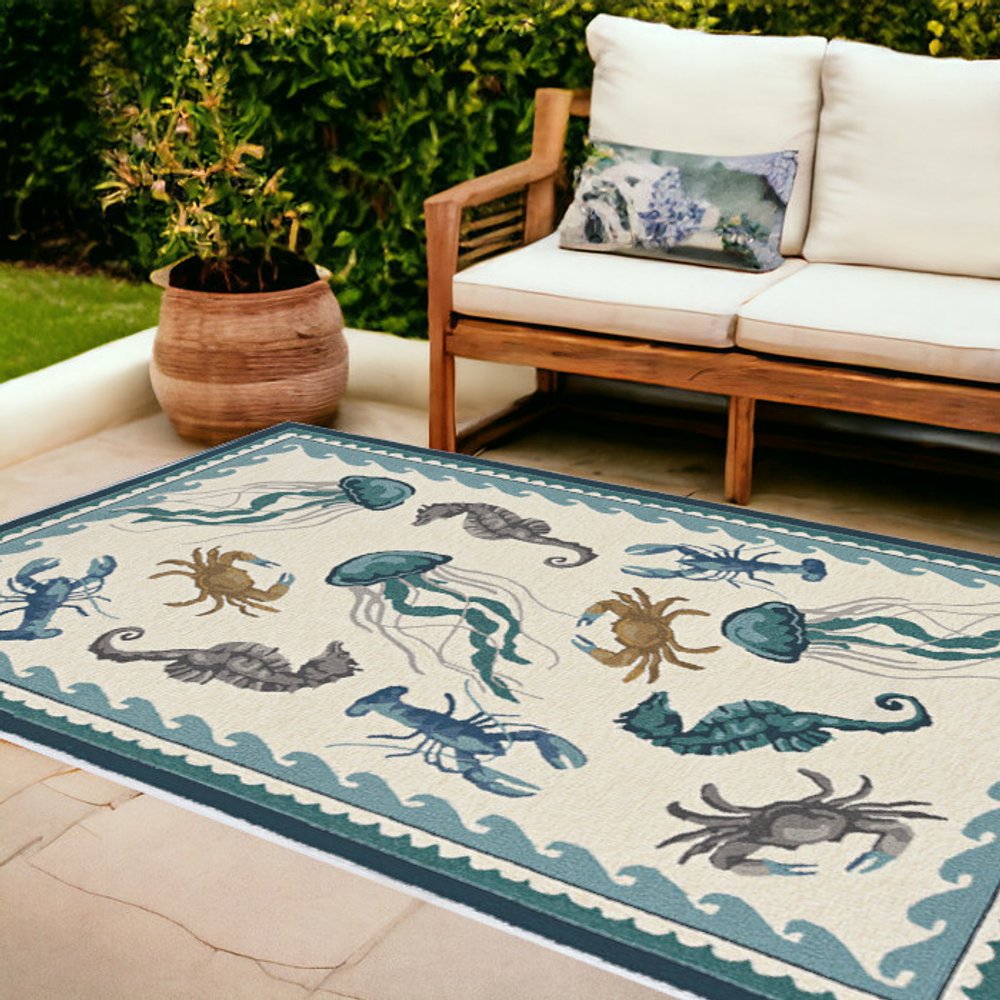 5' X 8' Teal Blue Round Abstract Indoor Outdoor Area Rug