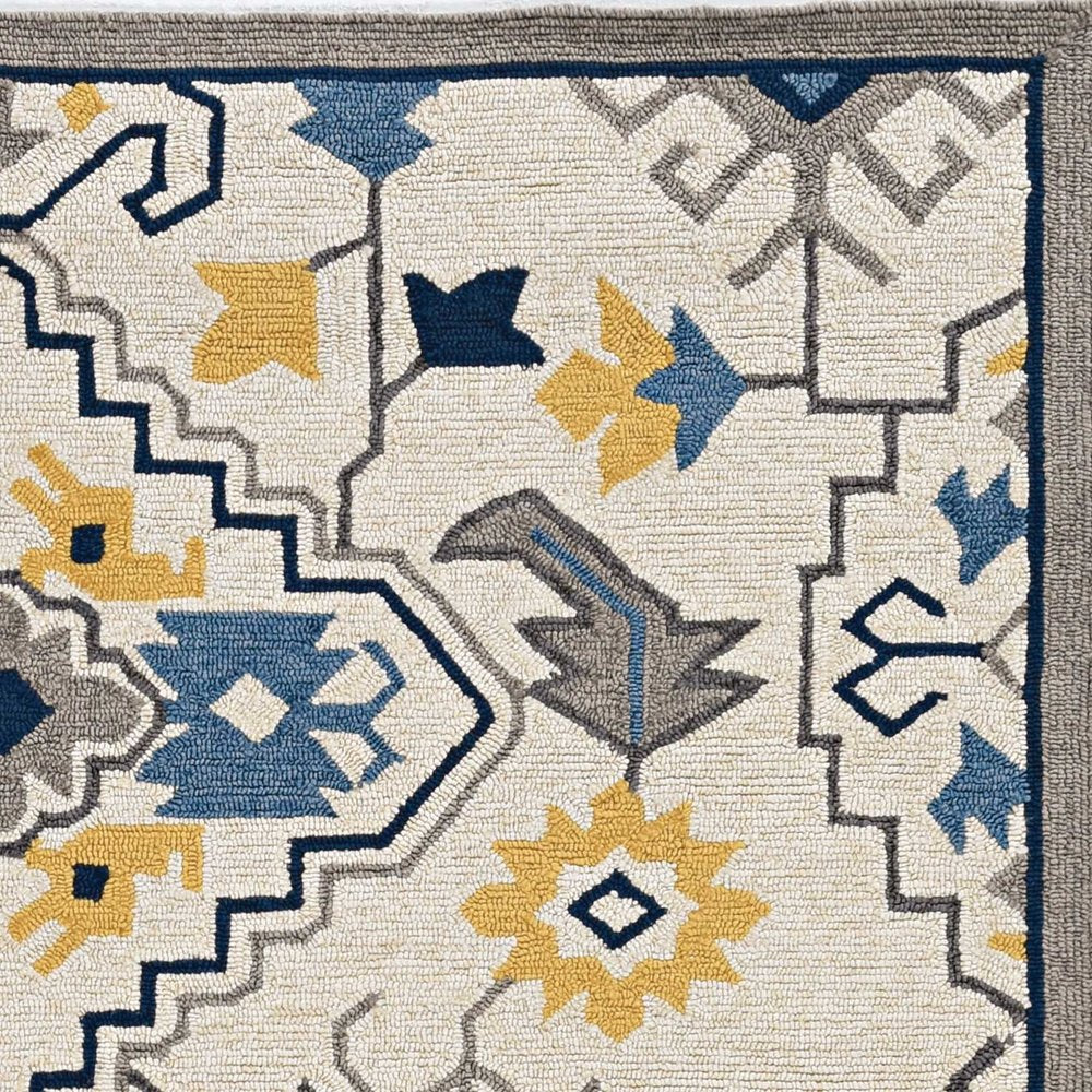 3' X 5' Ivory Blue And Yellow Southwestern Hand Tufted Area Rug