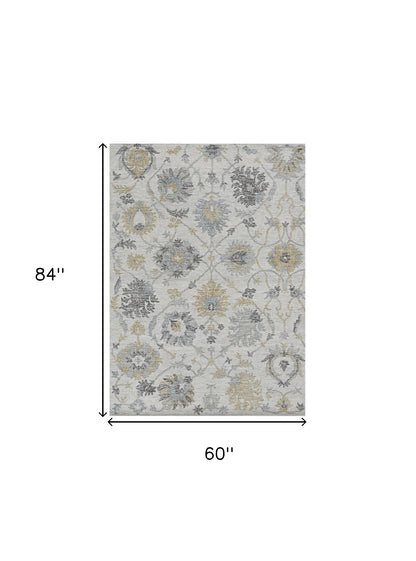 7' X 10' Ivory Hand Tufted Space Dyed Traditional Floral Indoor Area Rug