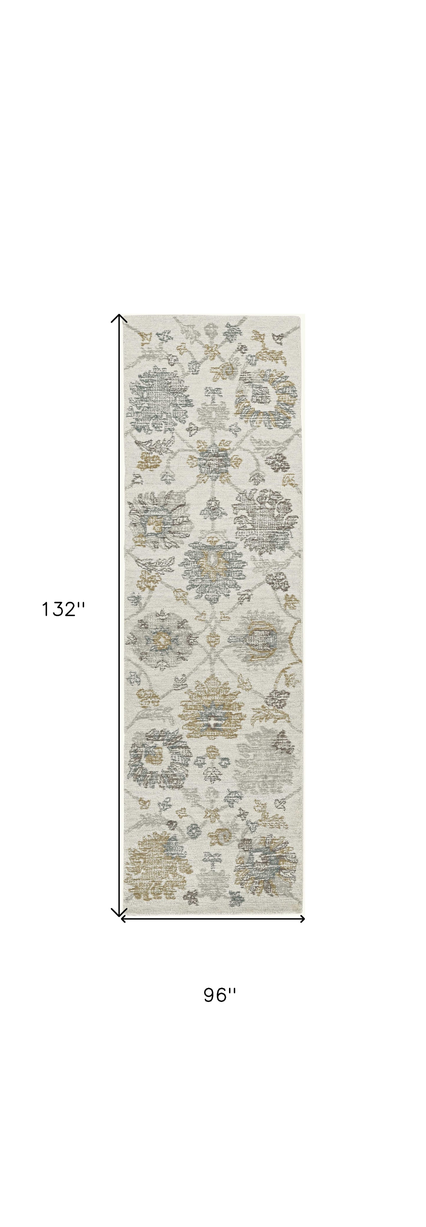 7' X 10' Ivory Hand Tufted Space Dyed Traditional Floral Indoor Area Rug