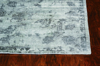 5' X 7' Beige Tan And Gold Abstract Hand Loomed Distressed Area Rug