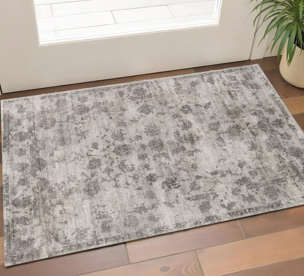 9' X 13' Gray And Dark Gray Floral Medallion Hand Loomed Distressed Area Rug