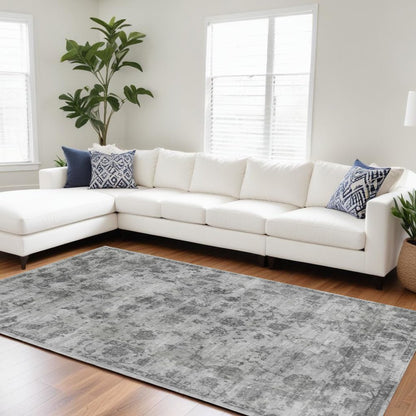 5' X 7' Beige Tan And Gold Abstract Hand Loomed Distressed Area Rug
