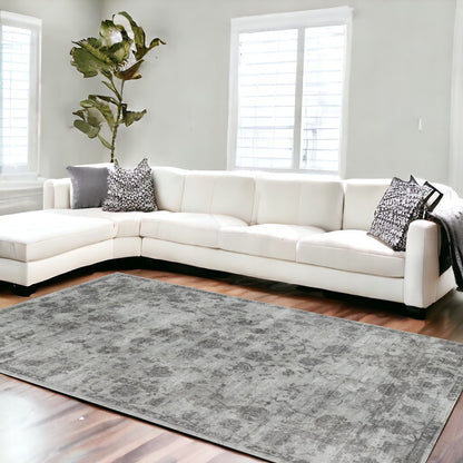 5' X 7' Beige Tan And Gold Abstract Hand Loomed Distressed Area Rug