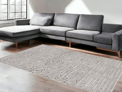 5' X 8' Gray And Black Abstract Distressed Area Rug