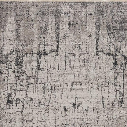 5' X 8' Ivory And Gray Abstract Distressed Area Rug