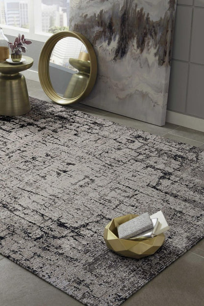 5' X 8' Ivory And Gray Abstract Distressed Area Rug