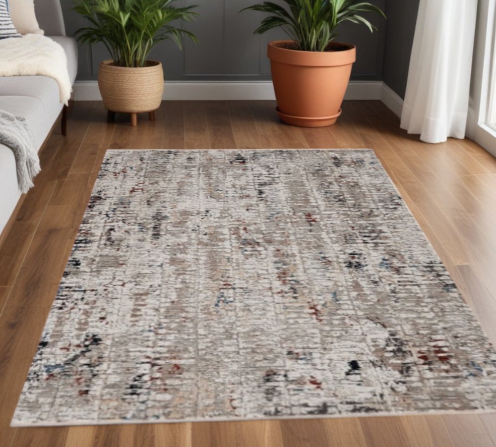 4' X 5' Beige And Gray Abstract Distressed Area Rug