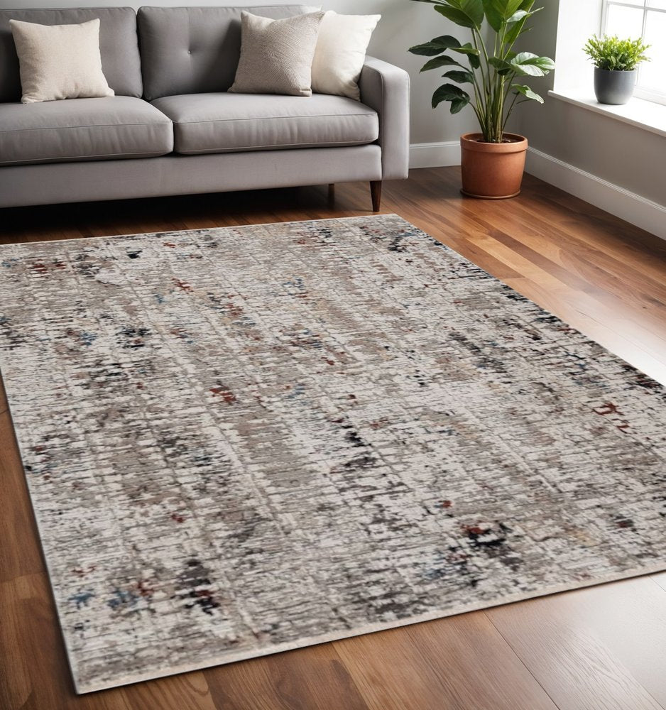 4' X 5' Beige And Gray Abstract Distressed Area Rug