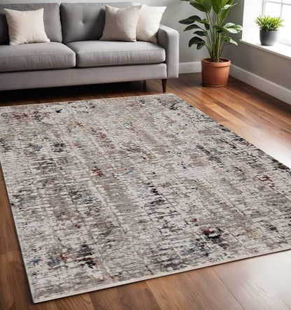 4' X 5' Beige And Gray Abstract Distressed Area Rug