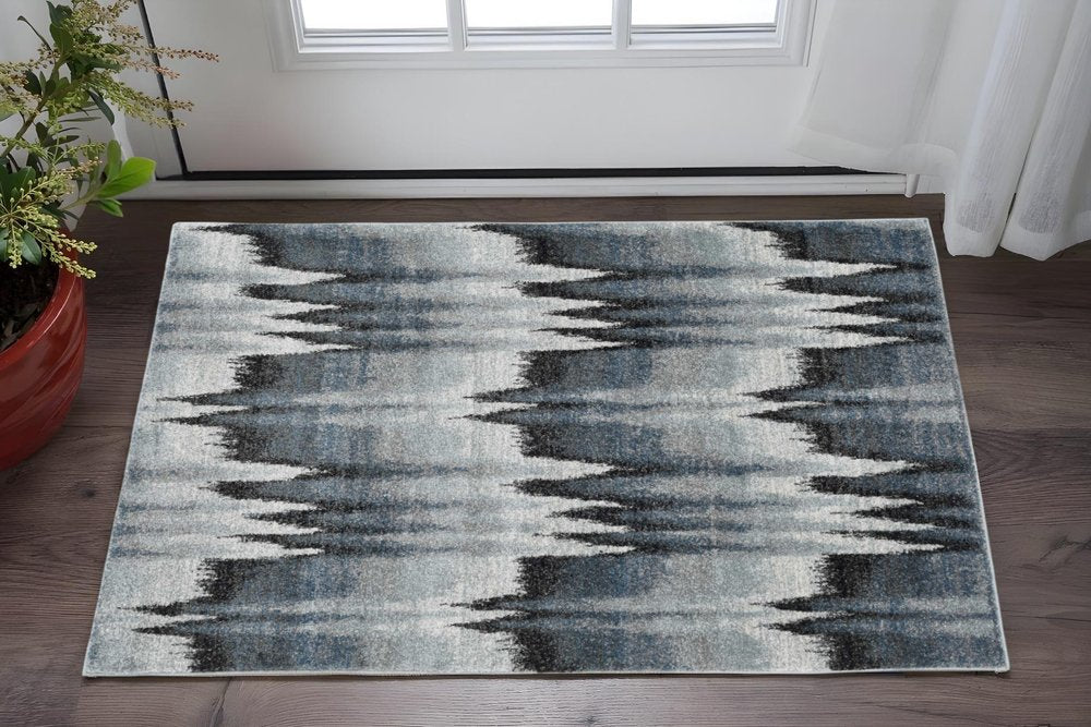 8' X 11' Ivory Blue and Gray Abstract Area Rug