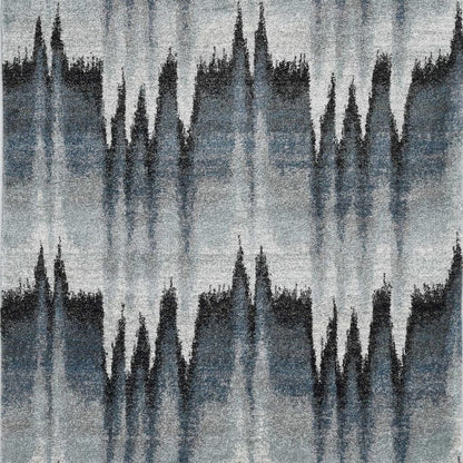 8' X 11' Ivory Blue and Gray Abstract Area Rug