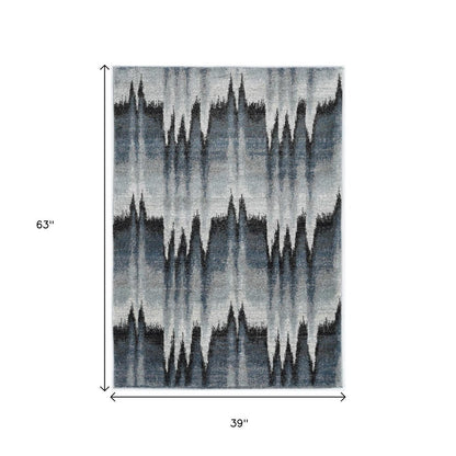 8' X 11' Ivory Blue and Gray Abstract Area Rug