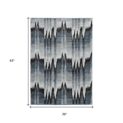 8' X 11' Ivory Blue and Gray Abstract Area Rug