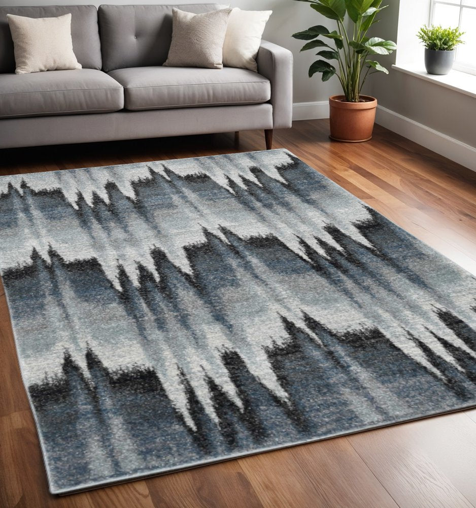 8' X 11' Ivory Blue and Gray Abstract Area Rug