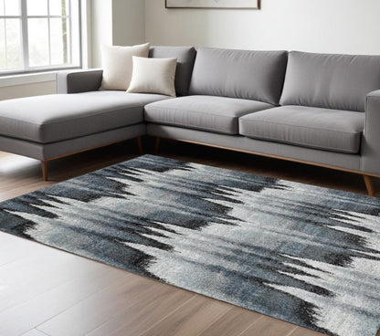 8' X 11' Ivory Blue and Gray Abstract Area Rug