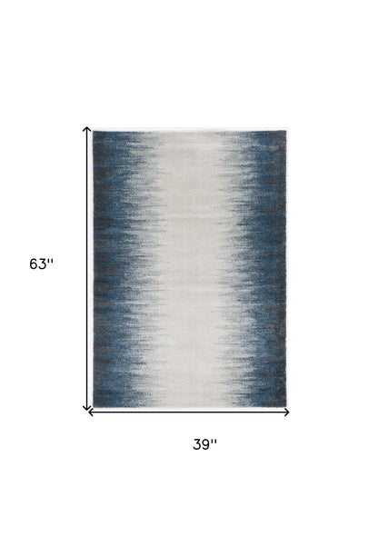 5' X 8' Ivory Or Blue Gradient Bordered Indoor Area Rug