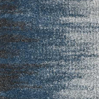 5' X 8' Ivory And Blue Abstract Area Rug